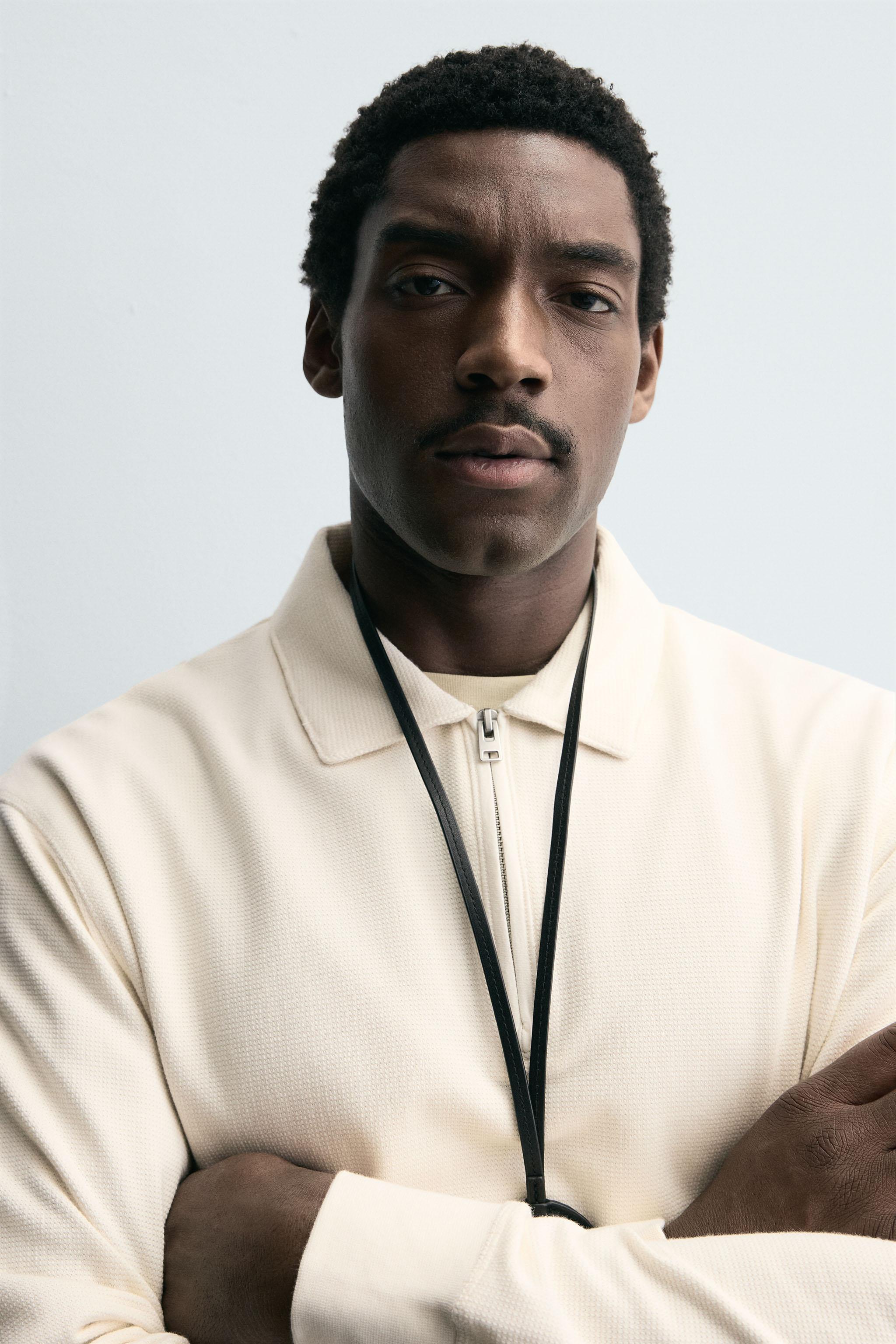 POLO STRUCTURÉ À ZIP